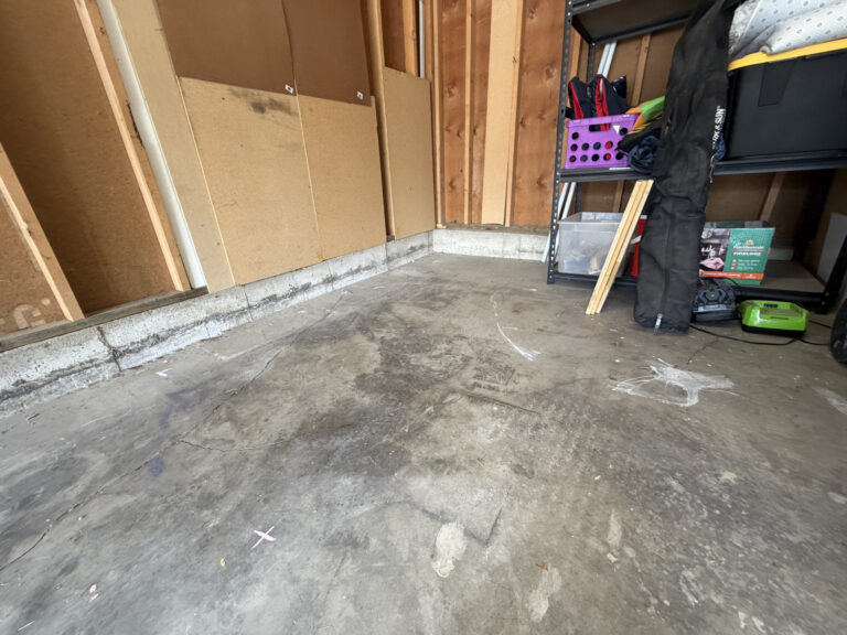 West Jordan garage floor before concrete lifting